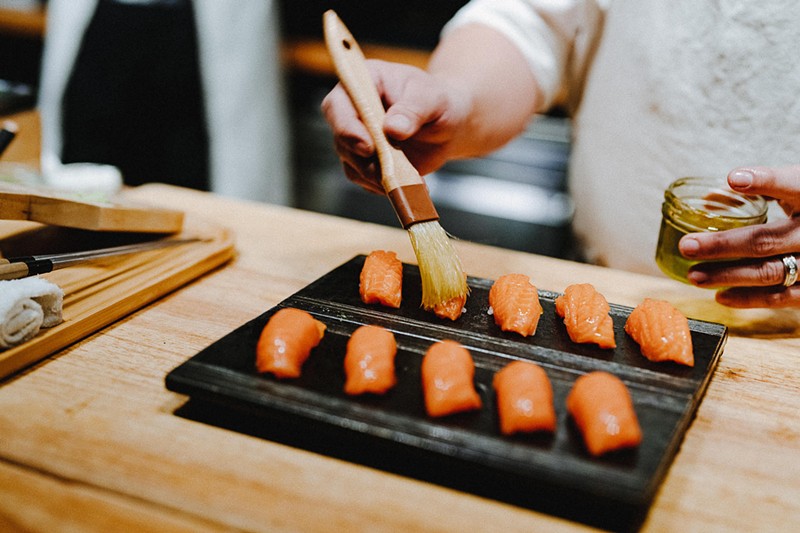 Nigiri is being prepared by a sushi chef at Sushi by Scratch in Coconut Grove.