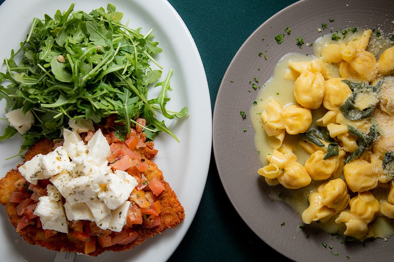 Two iconic dishes: vitello alla Milanese, a cutlet served with arugula, dressed with lemon olive oil, and topped with cherry tomatoes and diced bocconcini mozzarella (left) and fiocchi pasta, little pockets filled with pear and taleggio cheese (right).