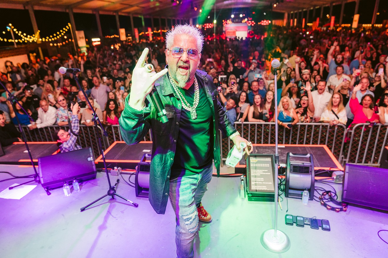 Rock on with Guy Fieri at Diners, Drive-Ins and Dives Live on February 23.