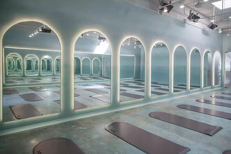 Image: a room with domed mirrors and domed mats on the ground