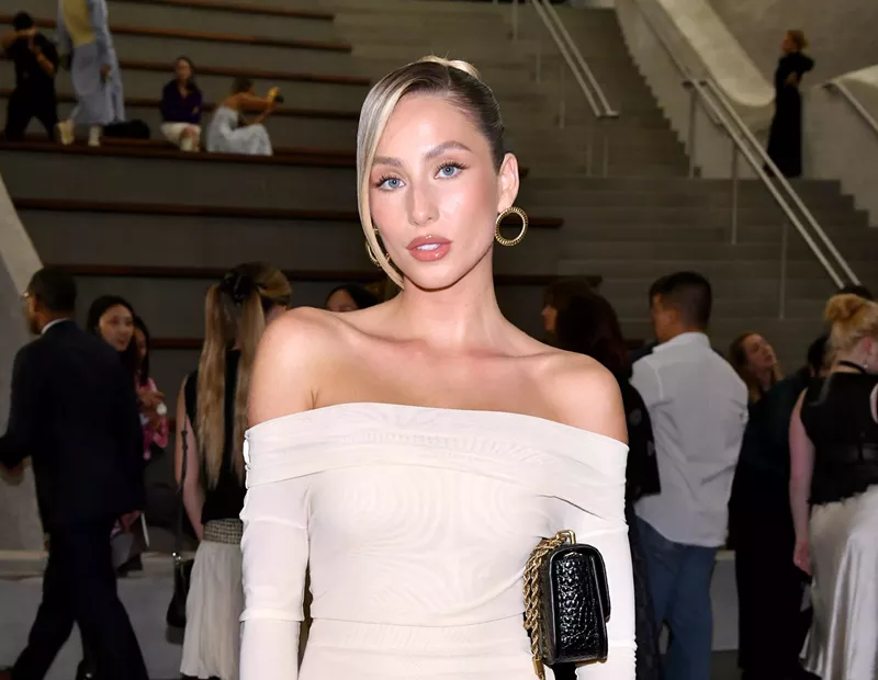 Image: Alix Earle in a long white, shoulderless dress