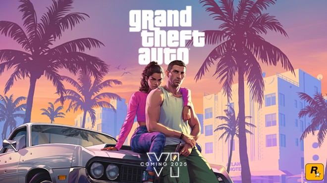 Grand Theft Auto VI's two playable characters, a man and woman, sitting on the hood of a car