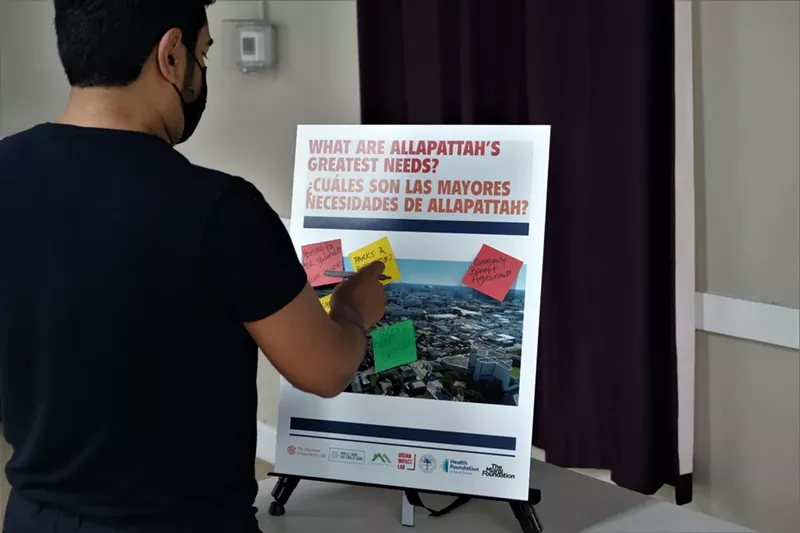 Image: Through a series of surveys and town hall meetings, pictured here, the housing advocacy groups asked Allapattah residents and business owners what they'd like to see included in the development of the GSA Lot.