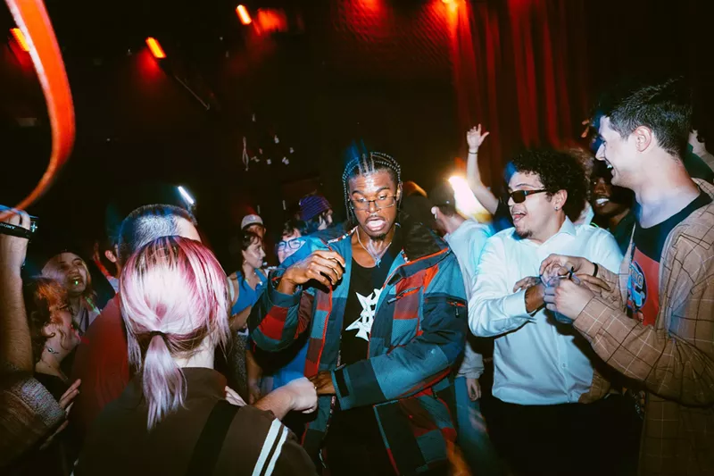 Image: A crowd of young people dancing