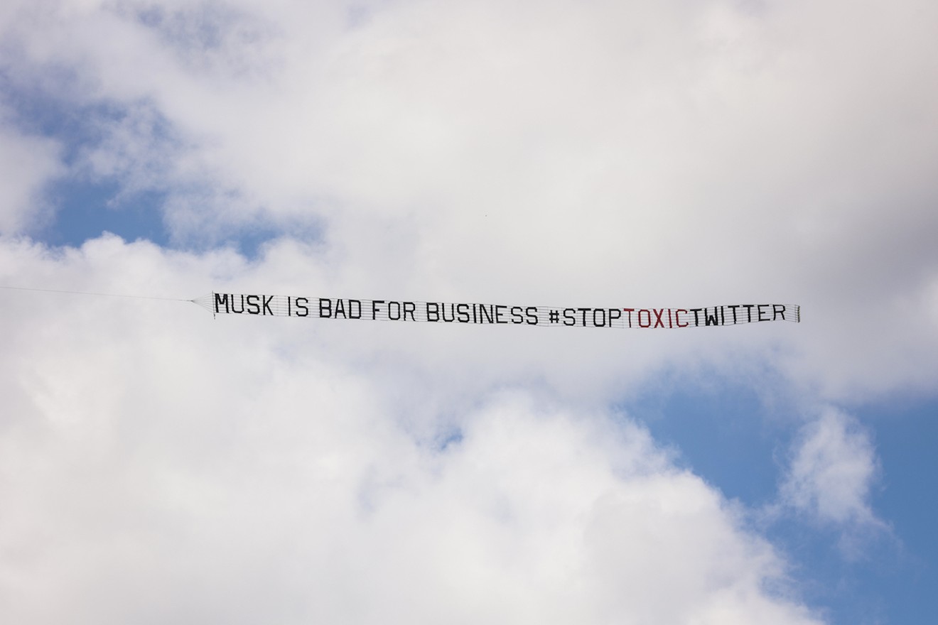 Activists flew banners above the Fontainebleau on April 18 to protest Twitter's tolerance of hate speech.