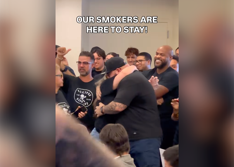 Image: Apocalypse BBQ owner Jeff Budnechky hugs colleagues and family over the Miami-Dade County win