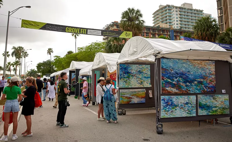 Image: People walking the streets of Coconut Grove for the Coconut Grove Arts Festival