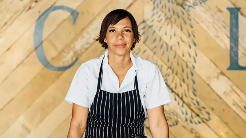 Image: A chef with an apron posing