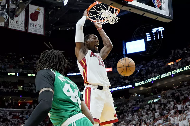 Image: Bam Adebayo slam dunks the ball with fury