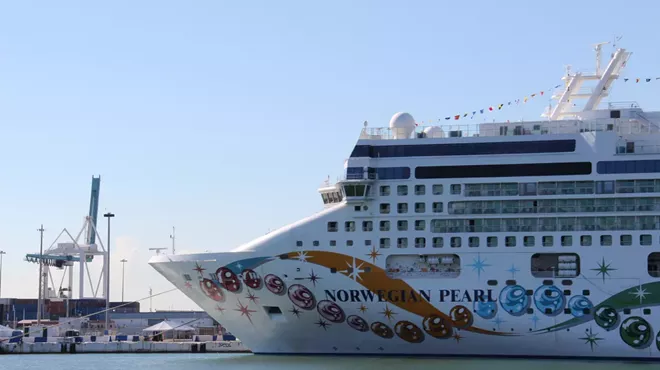 A cruise ship sits on the ocean