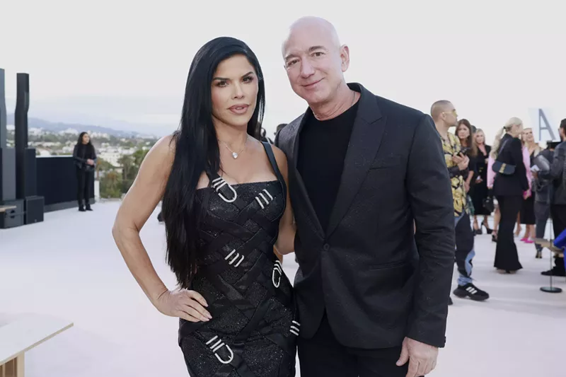 Image: Jeff Bezos and Lauren Sanchez attend the Versace FW23 Show in West Hollywood, California.