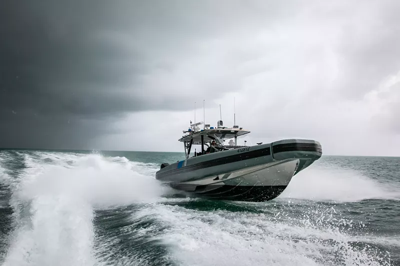 Image: A U.S. Customs and Border Protection boat patrols the waters near Miami Beach.