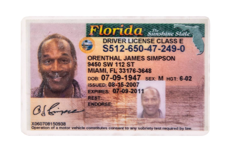 Image: O.J. Simpson's expired driver's license, with Simpson's smile visible under scuff marks