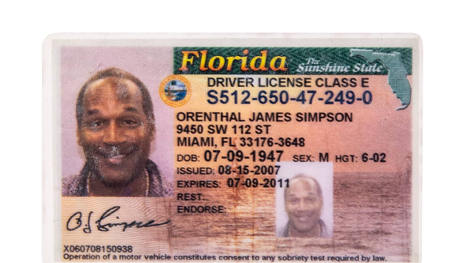 O.J. Simpson's expired driver's license, with Simpson's smile visible under scuff marks