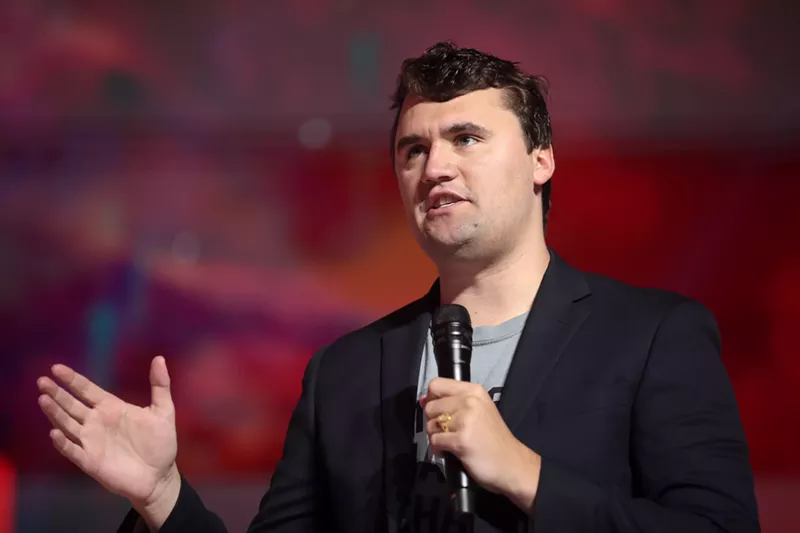 Image: Pictured is conservative commentator Charlie Kirk speaking at an event.