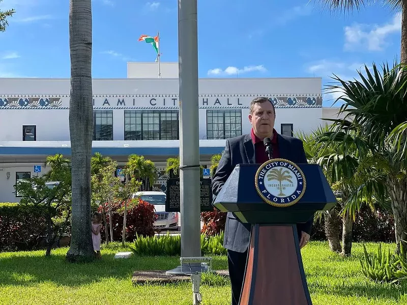 Image: City Commissioner Joe Carollo stands in front of Miami City Hall