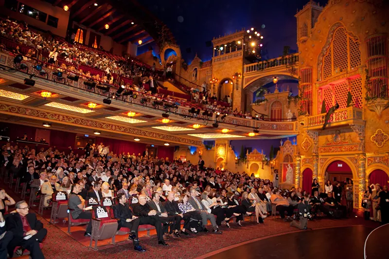 Image: an audience at a theater