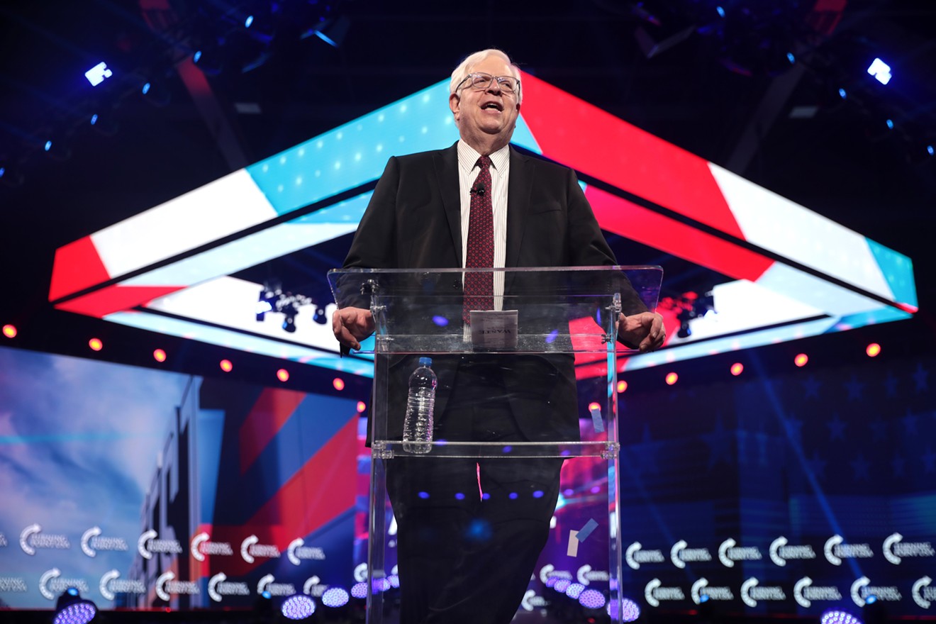 Dennis Prager speaks with attendees at the 2021 AmericaFest at the Phoenix Convention Center in Phoenix, Arizona.