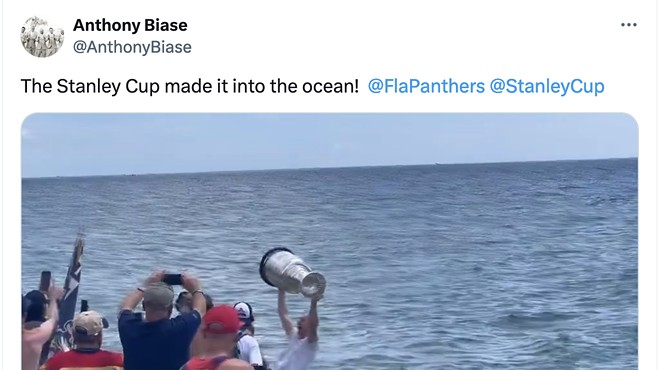 screenshot from a video showing the NHL Stanley Cup getting a dip in the Atlantic Ocean