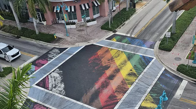 Depicted is a blacked-out pride street display in Delray Beach.