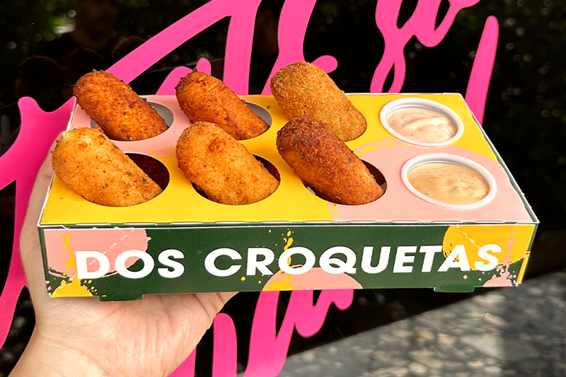 A flight of delicious croquetas and dipping sauces from Dos Croquetas.