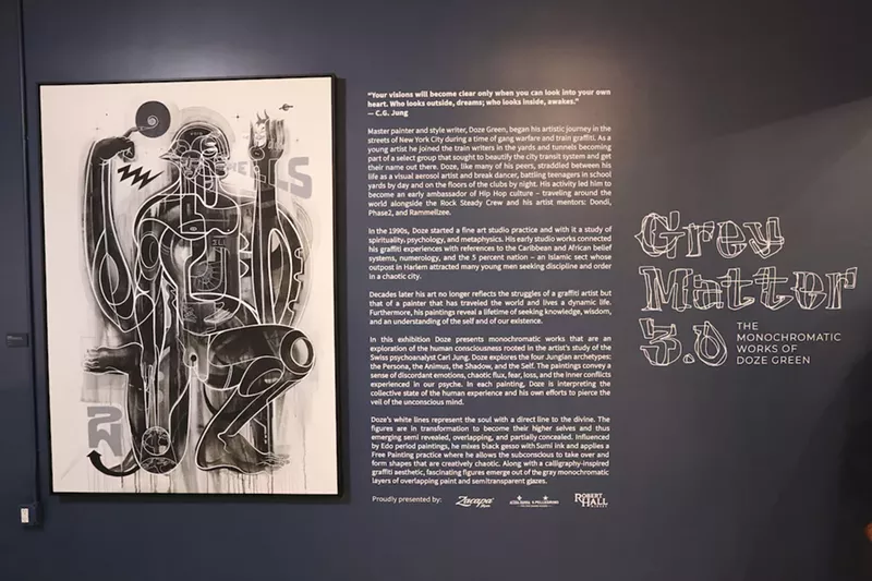 Image: Doze Green ditches his signature vibrant colors at the Museum of Graffiti exhibition.