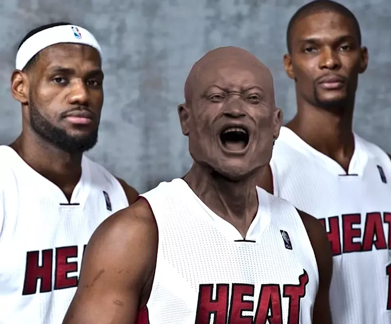 Image: photo of the Miami Heat "Big Three" of LeBron James, Dwyane Wade, and Chris Bosh, with Wade's head subbed out for the screaming head of his statue outside the Kaseya Center