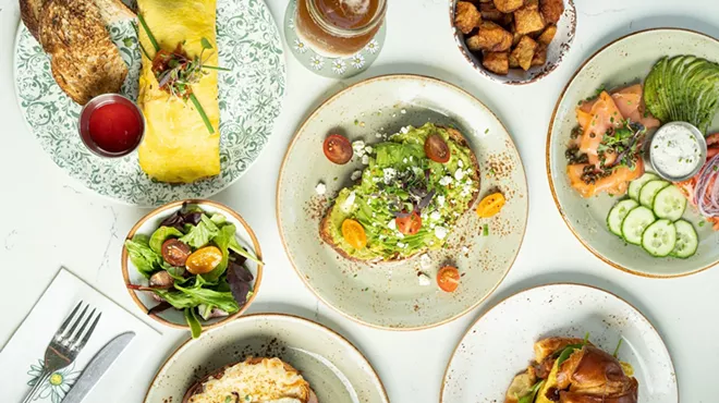 Various breakfast dishes on a table from Cafe Bastille