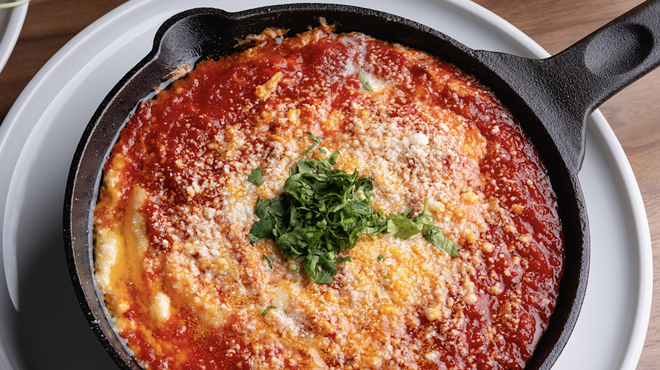 Bar Luca's Eggs in Purgatory served in a cast-iron pan