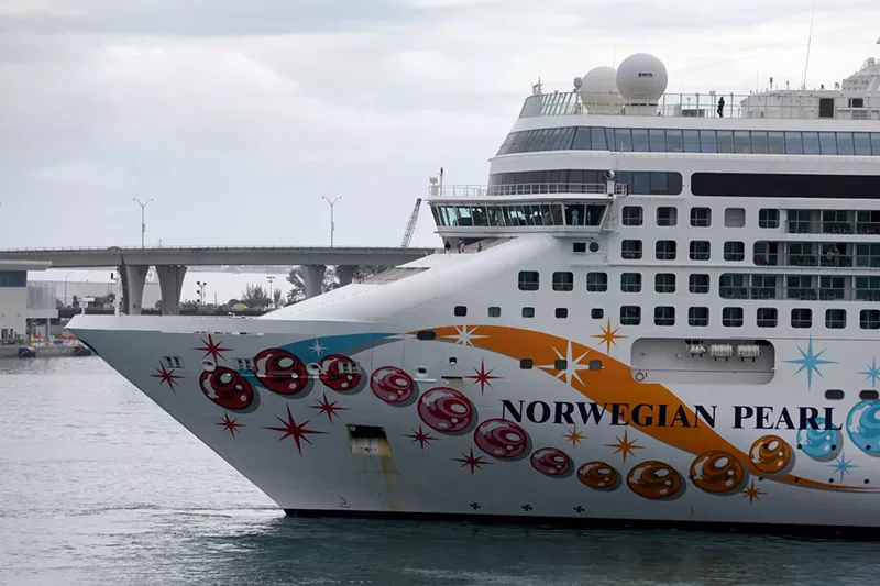 Image: A large cruise ship docks at a Miami port