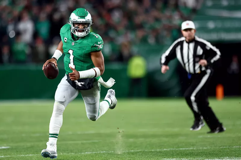 Image: Philadelphia Eagles' quarterback Jalen Hurts takes off in a game against the Miami Dolphins on October 22, 2023 in Philadelphia.