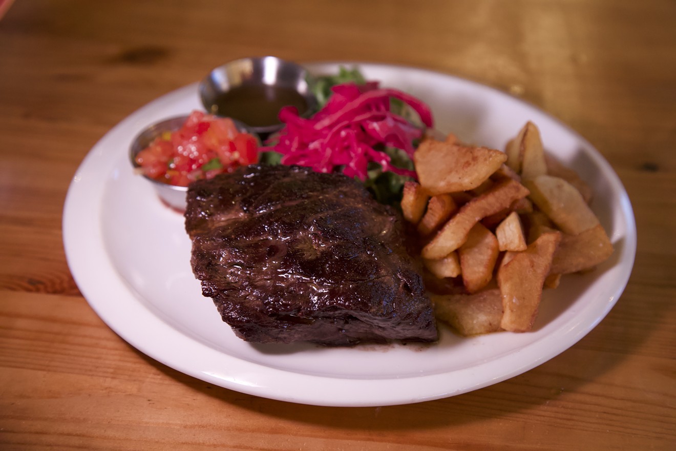 Vacio (flank) steak — grilled to perfection and paired with hand-cut French fries and chimichurri sauce.