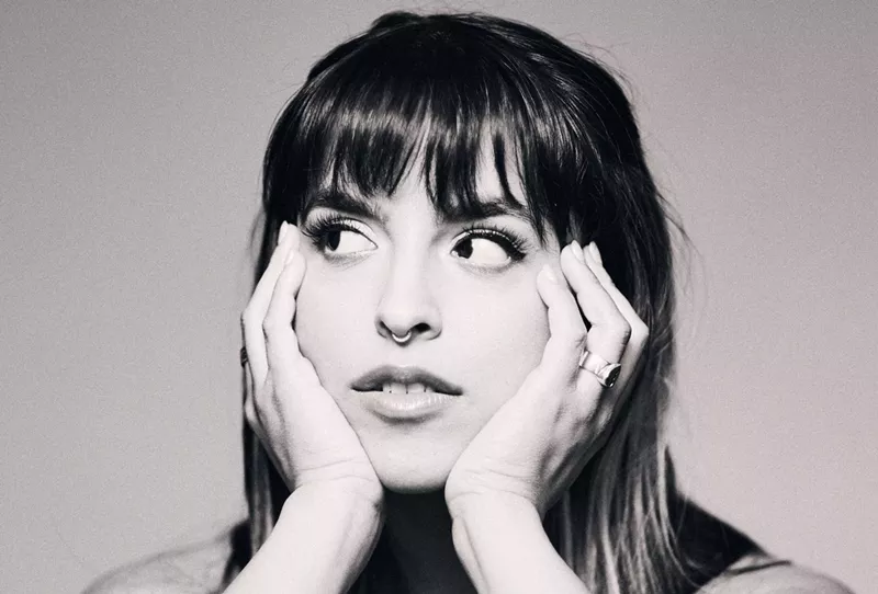 Image: Black and white image of Gale with her hands under her chin