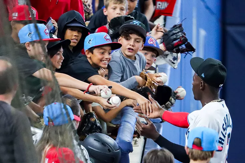Image: Marlins player Jazz Chisholm signs for a group of fans prior to a game on April 17, 2022 in Miami, Florida.