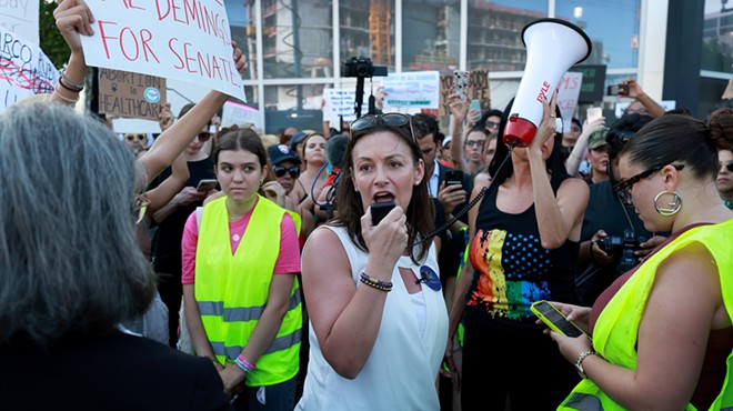 A crowd gathers in the streets of Miami during a protest for abortion rights