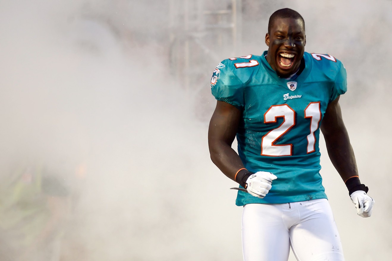 Good times: Vontae Davis takes the field for the Dolphins' September 2011 season opener.