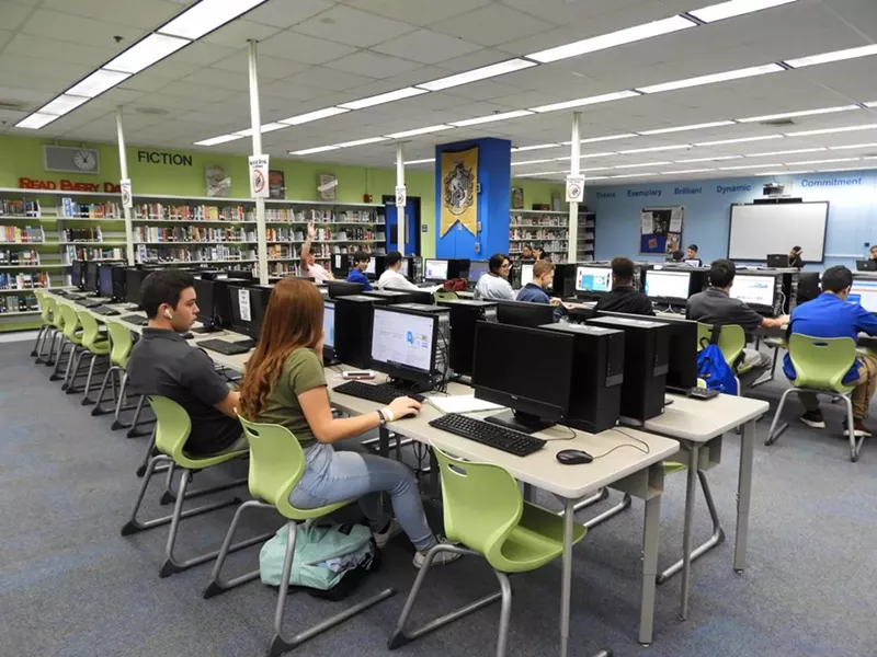 Image: Pictured are high school students working on computers in a computer lab in a Hialeah high school.