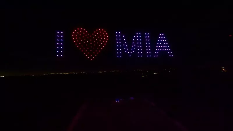 Image: Drones spelling out I heart MIA in the night sky