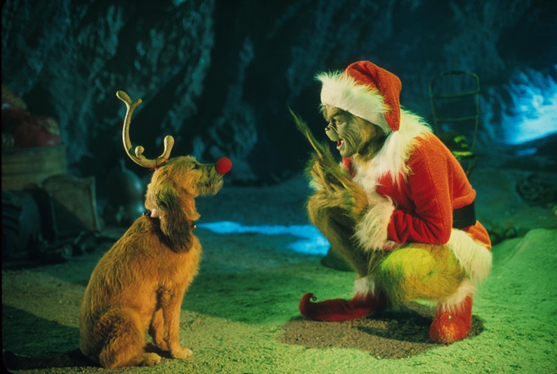 The Grinch conspires with his dog Max to deprive Whoville of their favorite holiday.