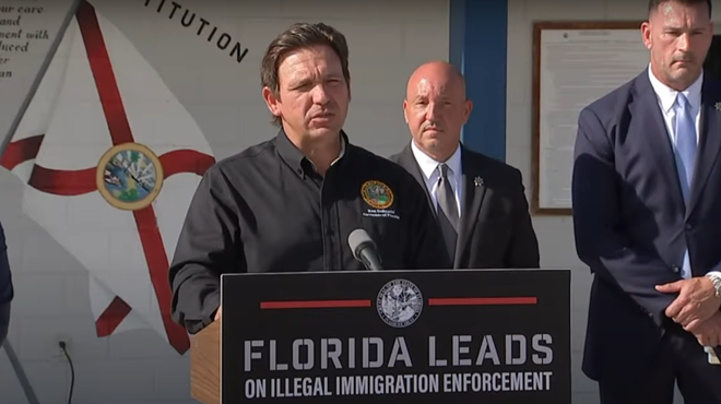 Gov. Ron DeSantis speaking at a press conference.