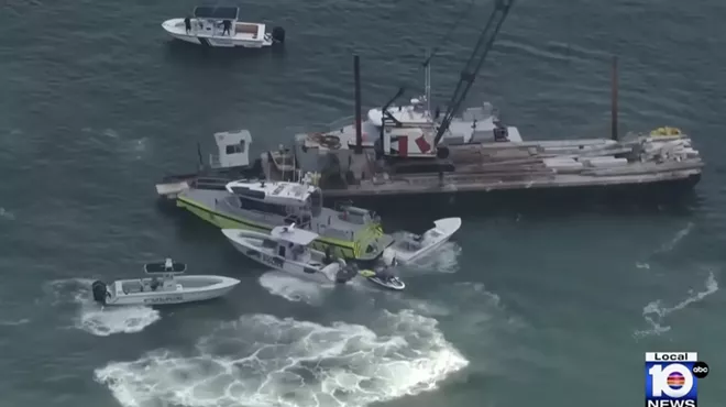 aerial photo showing the aftermath of a July 28, 2025, collision between a barge and a small sailboat off Hibiscus Island north of the MacArthur Causeway, Miami Beach