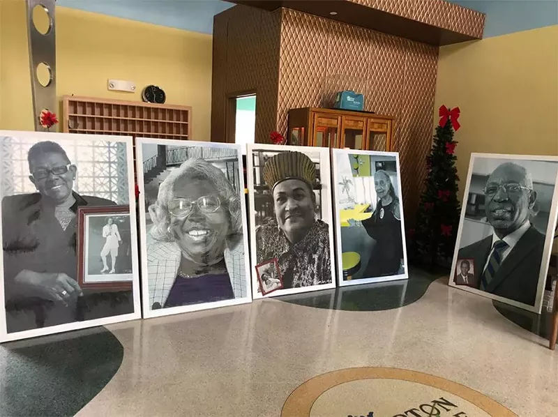 Image: The series of portraits includes QR codes that visitors may scan to view video recordings of each person featured.