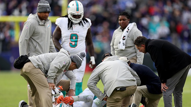 Injured Miami Dolphins linebacker splayed out on the field