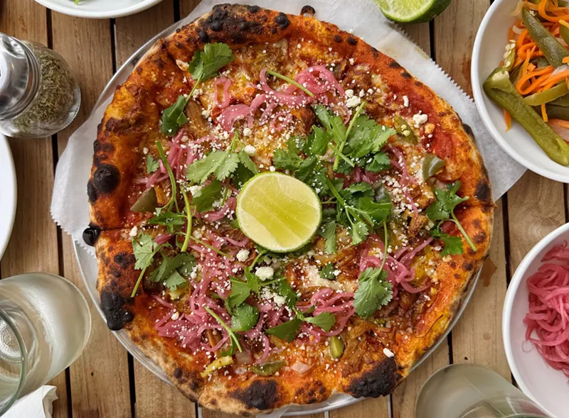 Image: a pizza with toppings