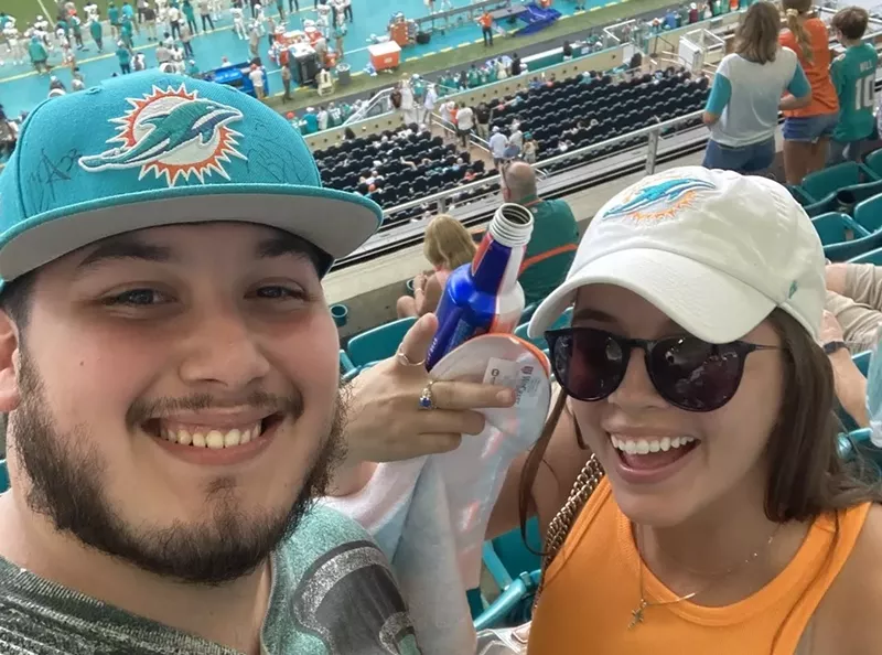 Image: Omar Sicle is on a journey to find a fellow Dolphins fan from Section 347.
