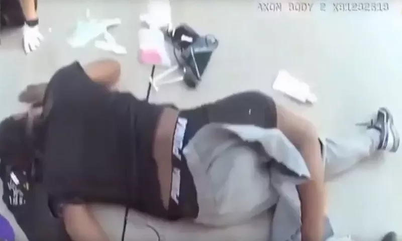 Image: Craig Nembhard screams in pain moments after his leg is broken by Doral police following an argument over a traffic stop.