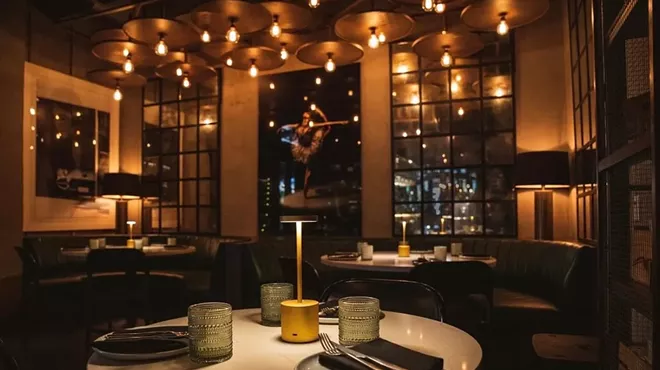 Picture of a table at a restaurant with dim lights.