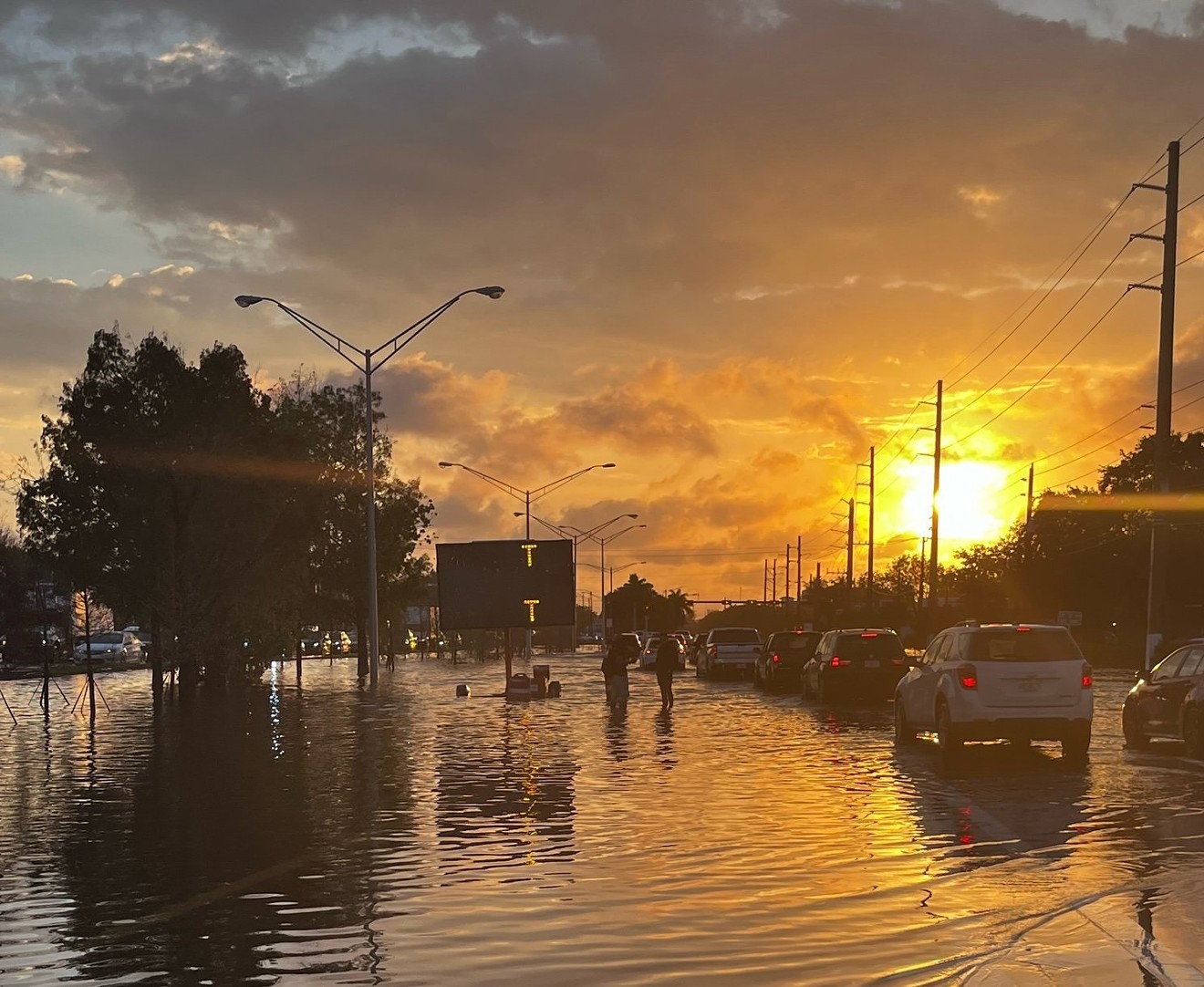 The sun rises over waterlogged Broward County after a night of historic rain.