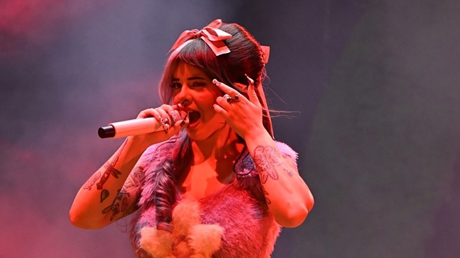 Melanie Martinez on stage at the Amerant Bank Arena