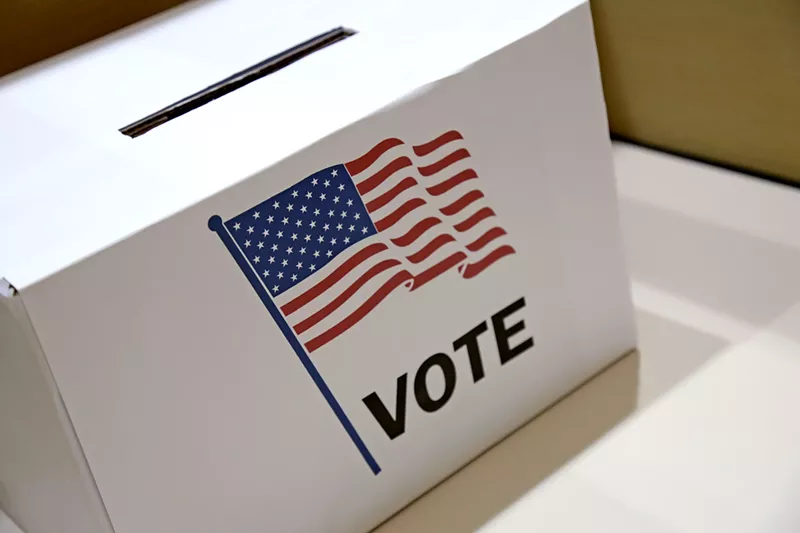 Image: A ballot box sits at an election center.